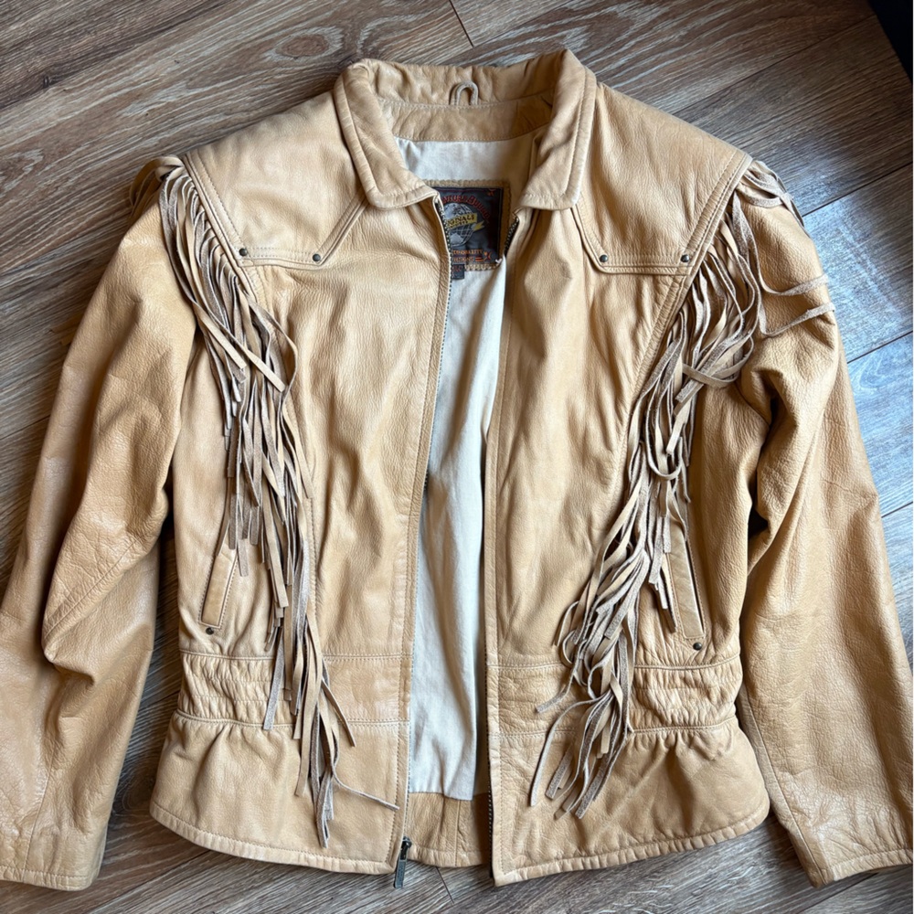 Vintage Wilson’s Adventure Bound Tan Fringe Leather Jacket
